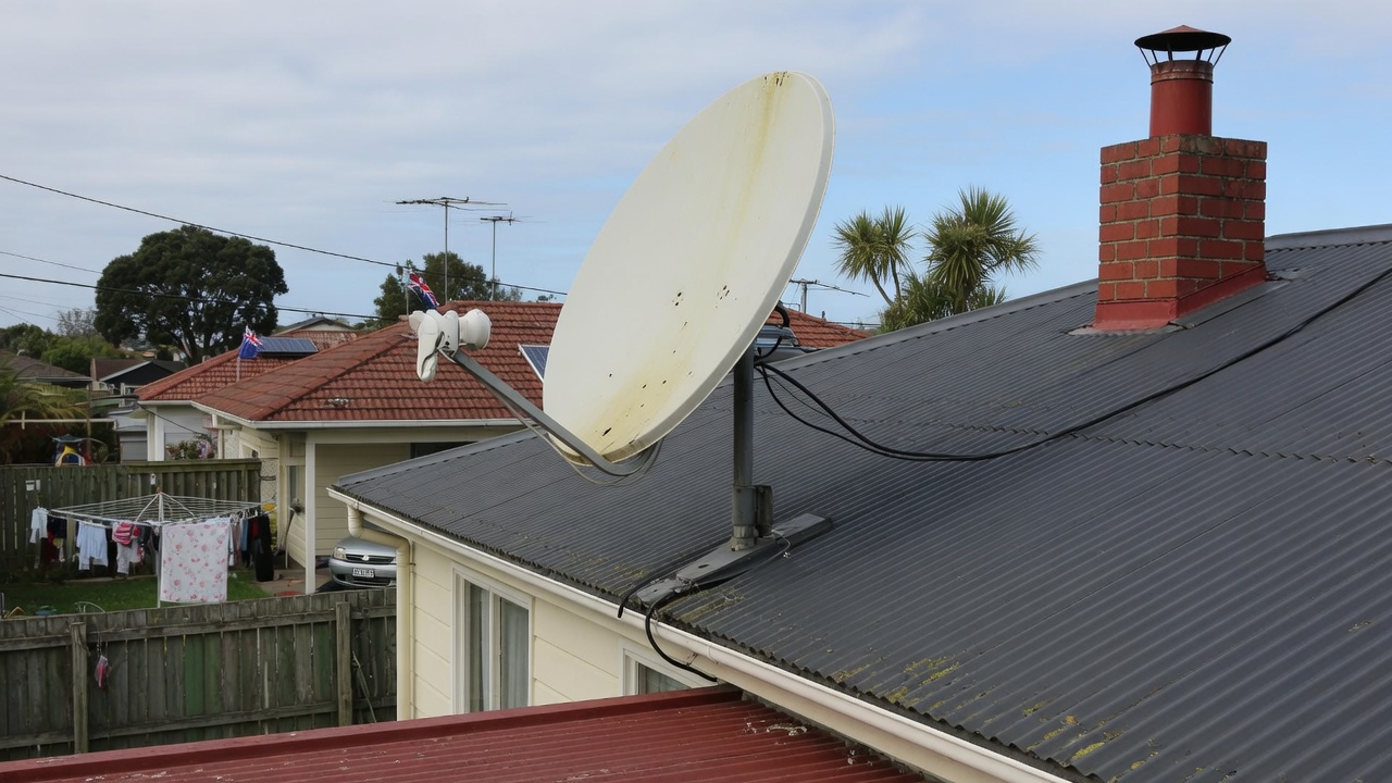 Satellite TV dish in daylight